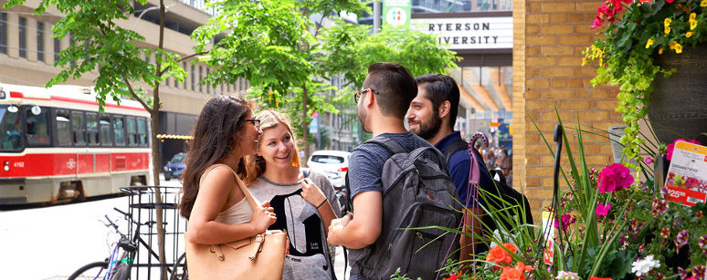 Friends meeting up outside Parkside student residence.